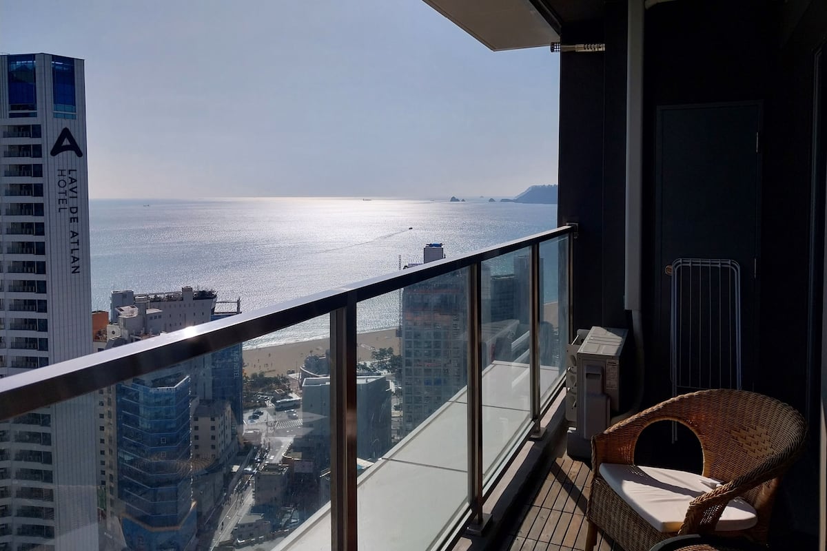 Panoramic Double Room, Ocean View | Living area | Flat-screen TV