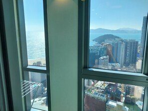 Deluxe Double Room, Partial Ocean View | Blackout curtains, soundproofing, iron/ironing board, free WiFi