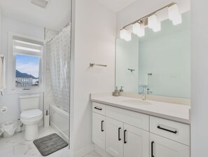 Hair dryer, towels, soap, shampoo