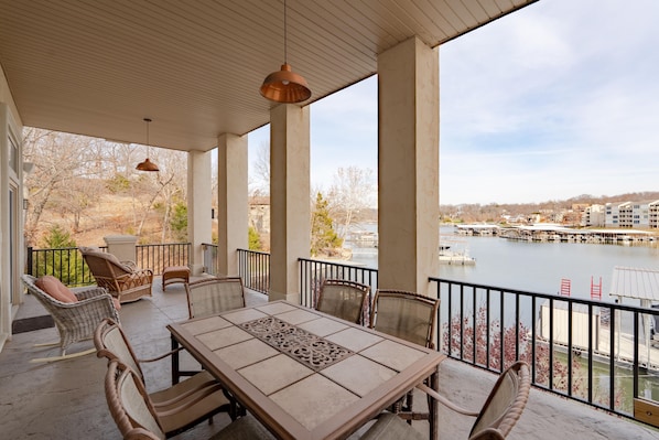 Outdoor dining - Luxury Lakefront Dream Home w/ Boat Dock and Volleyball Court! (Osage Beach)