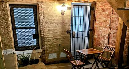 Charming 1-bedroom, 1 bathroom townhome in awesome Baltimore with WiFi, AC