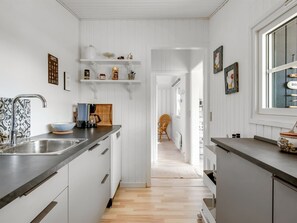 Fridge, microwave, dishwasher, cookware/dishes/utensils