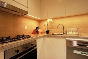 Fridge, microwave, oven, stovetop - 1BR in Downtown Views with Access to Dubai Mall (Dubai)