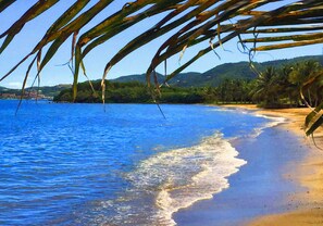 On the beach, sun-loungers, beach towels