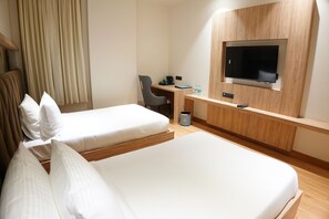 Deluxe Double or Twin Room, City View | Premium bedding, minibar, desk, blackout drapes