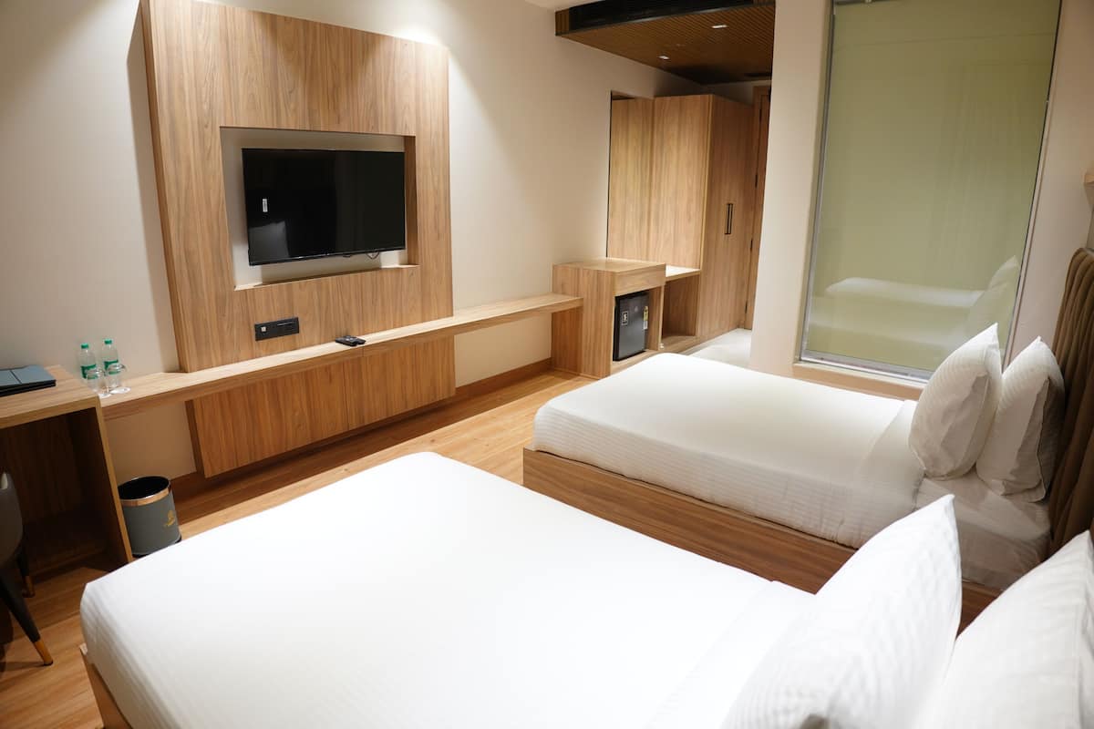 Deluxe Double or Twin Room, City View | Premium bedding, minibar, desk, blackout curtains