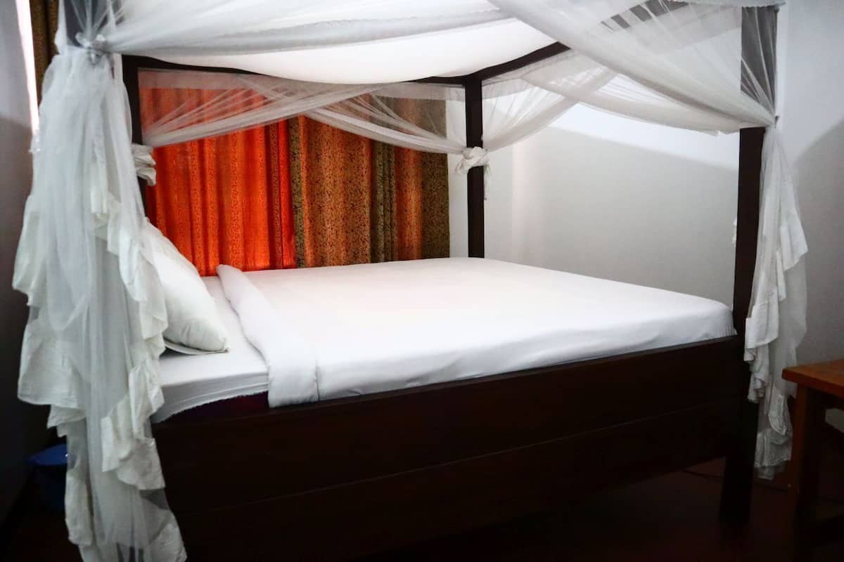Desk, laptop workspace, blackout curtains, free WiFi