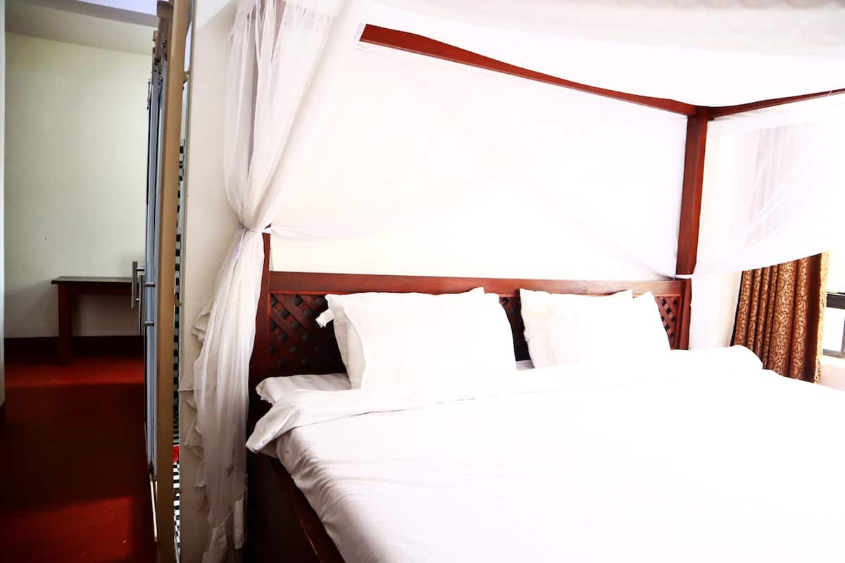 Desk, laptop workspace, blackout curtains, free WiFi