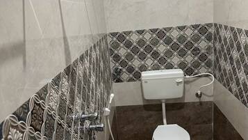 Shower, rainfall showerhead, soap, shampoo
