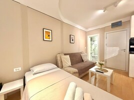 Premium bedding, memory-foam beds, soundproofing, iron/ironing board