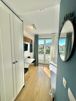 Premium bedding, memory-foam beds, soundproofing, iron/ironing board