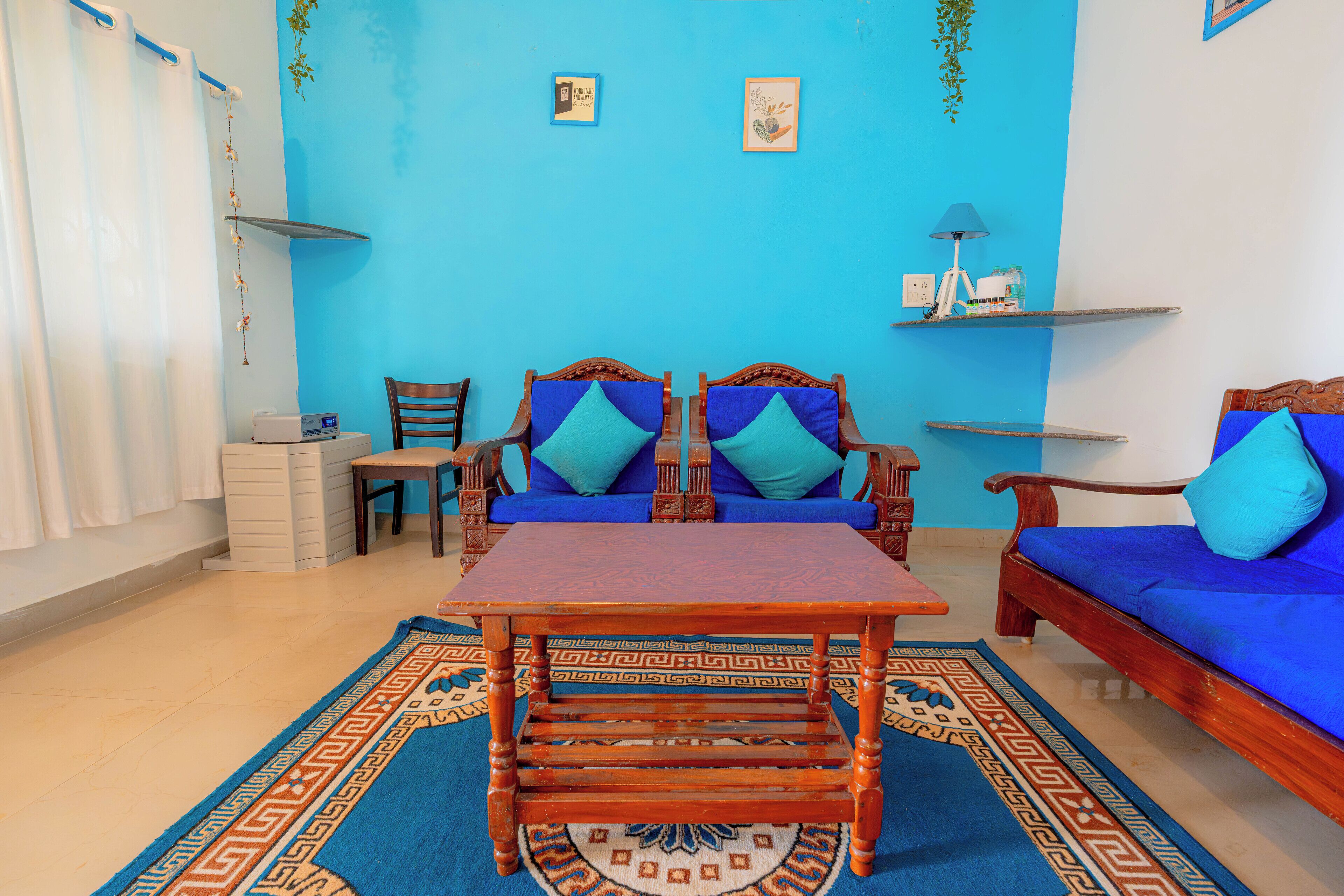 Standard-Studiosuite, Balkon, Gartenblick | Wohnbereich