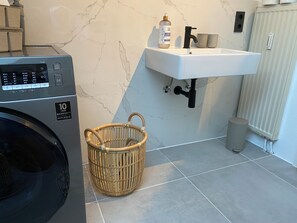 Hair dryer, towels, soap, toilet paper