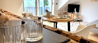 BioLoft by the lake and distant views. Cozy vacation apartment on the top floor