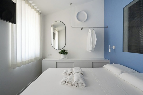 Memory-foam beds, blackout curtains, soundproofing, free WiFi