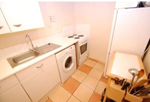 Apartment | Private kitchen | Fridge, microwave, oven, stovetop