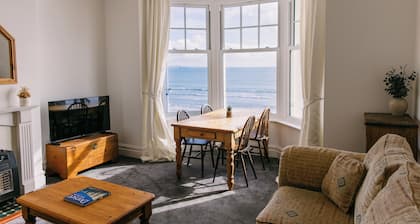 Beach side, newly renovated apartment with fantastic sea views.