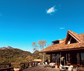 Outdoor dining - Magnificent Rio views in this unique large and cozy family home. Pets welcome. (Jardim Botânico Rio de Janeiro)