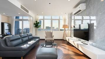 Deluxe Apartment, 3 Bedrooms, City View | Memory-foam beds, in-room safe, desk, laptop workspace