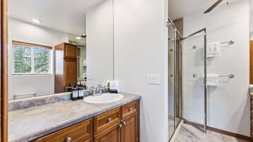 Shower, hair dryer, towels
