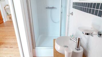Shower, hair dryer, soap, shampoo