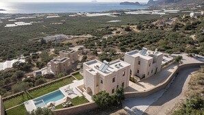 A coastal villa with a swimming pool, terraced garden, and views of the sea and mountains. - GG Villas Falassarna (Disability Access) (Chania)