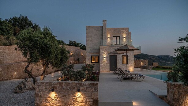 A stone villa with a pool, outdoor seating, and a view of the hills. - GG Villas Falassarna (Disability Access) (Chania)