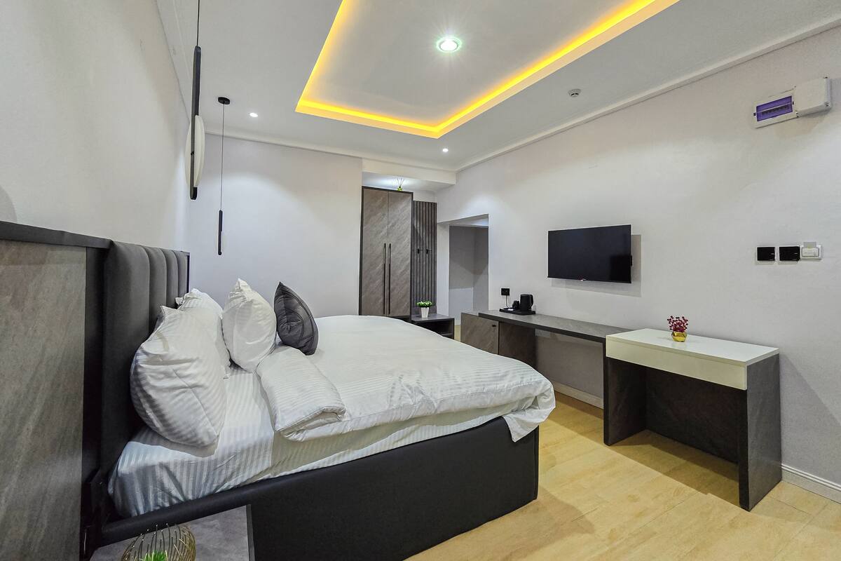 Premium bedding, desk, laptop workspace, free WiFi