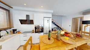 Fridge, dishwasher, coffee/tea maker, toaster