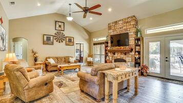 TV, fireplace, books