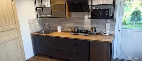 Fridge, microwave, stovetop, coffee/tea maker