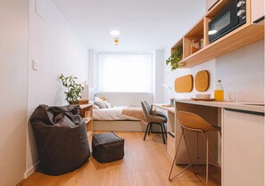 Habitación individual Deluxe, 1 habitación, no fumadores | 1 dormitorio, cortinas opacas, wifi gratis y ropa de cama
