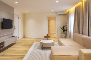 Suite | Living area | TV - Clay House by Husk Collection (Abuja)