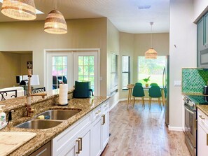 Fridge, microwave, oven, stovetop - Quiet Lakefront Getaway in Sarasota: Pool, Hot Tub & Outdoor Kitchen Near Beach (Sarasota)