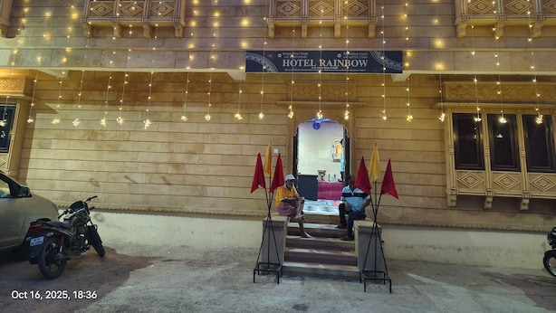 A hotel entrance with a sign reading "Hotel Rainbow." - Hotel Rainbow Jaisalmer (Jaisalmer)