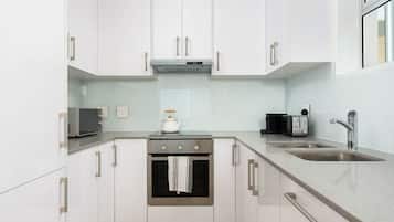 Fridge, oven, dishwasher, dining tables