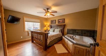 Cabin 8 Our Romantic Suite offers a jetted tub and views of Mille Lacs lake