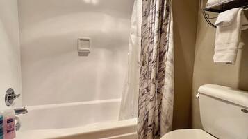 Hair dryer, towels, soap, shampoo