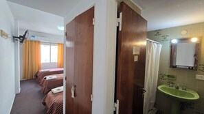Basic Triple Room, 1 Bedroom, City View | 1 bedroom, in-room safe, blackout drapes, free WiFi