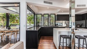 Fridge, microwave, oven, stovetop - Sandcastles- Luxury Beach House (Casuarina)