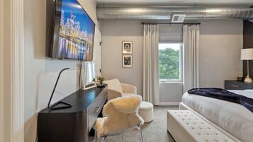 1 bedroom, desk, iron/ironing board, travel crib