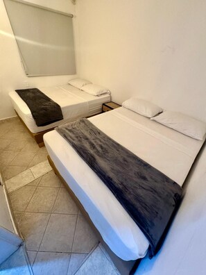 Chambre Quadruple Deluxe | Bureau, Wi-Fi gratuit