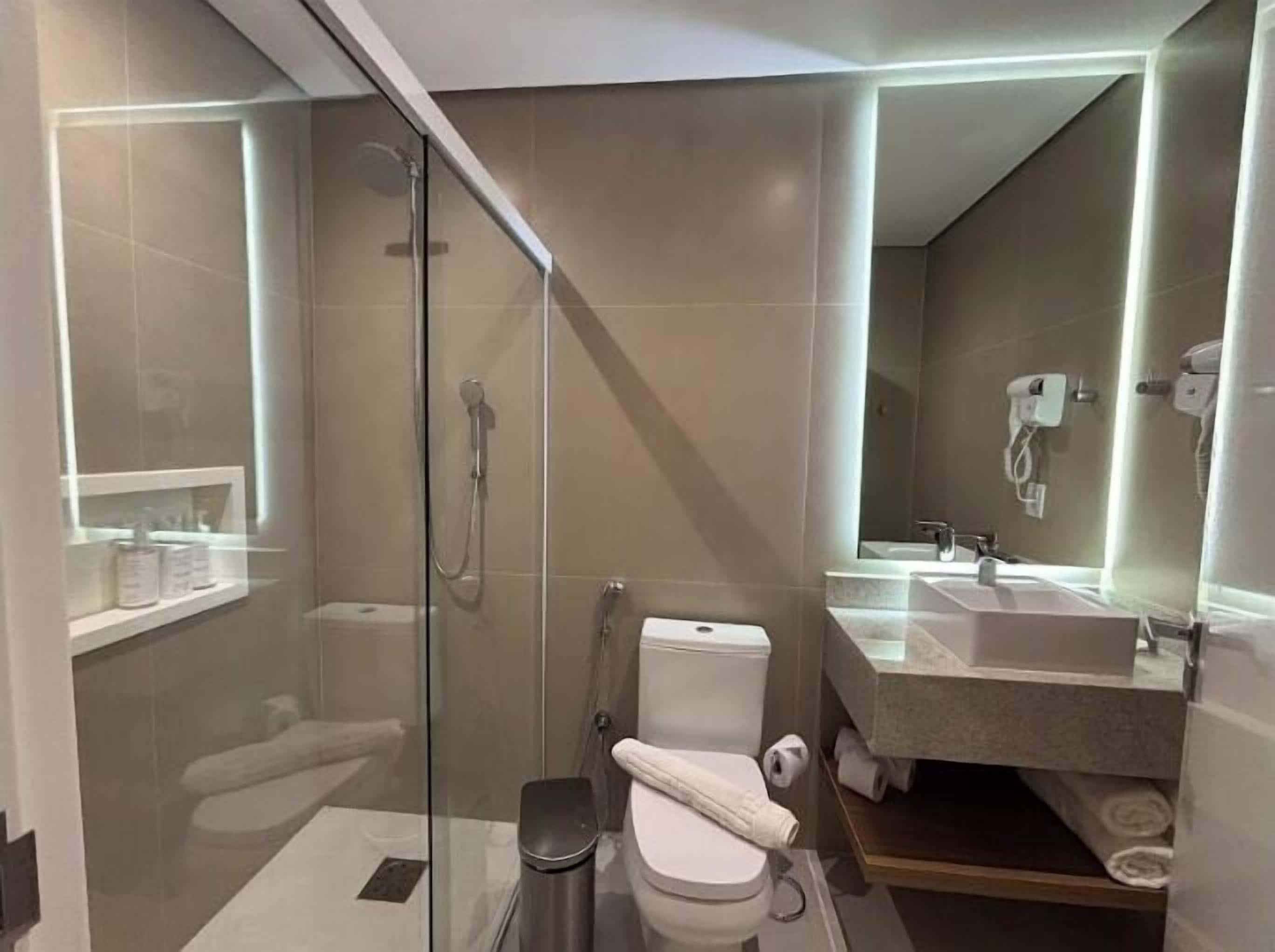 Hair dryer, towels, soap, shampoo