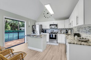 Fridge, microwave, oven, stovetop - The Naples Getaway House with Hot Tub
(Naples)