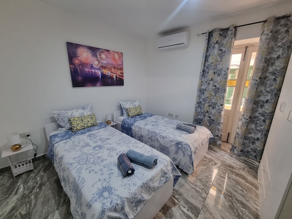 2 habitaciones, cuna de viaje, wifi y ropa de cama 