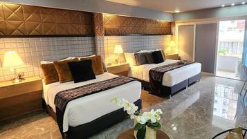 Family Room, Balcony, City View | Select Comfort beds, minibar, desk, blackout drapes