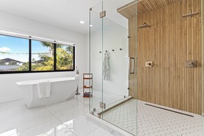 Shower, hair dryer, towels, soap