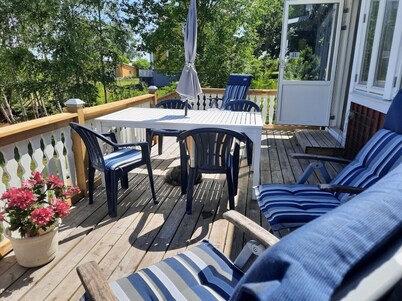 Holiday home with panoramic views over the lake and private boat