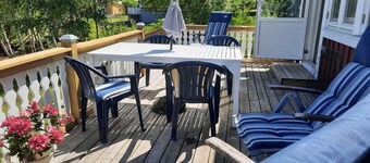 Holiday home with panoramic views over the lake and private boat