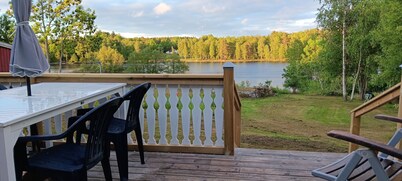 Holiday home with panoramic views over the lake and private boat